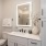 well lit bathroom vanity with sink