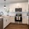c-shaped kitchen with ample lighting