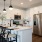 open kitchen serving counter with chairs