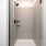 walk-in shower with glass door